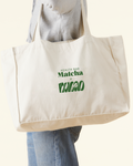 Health Bar Matcha x nucao Tote Bag aus Baumwolle mit grünem Co Branding Logo Print